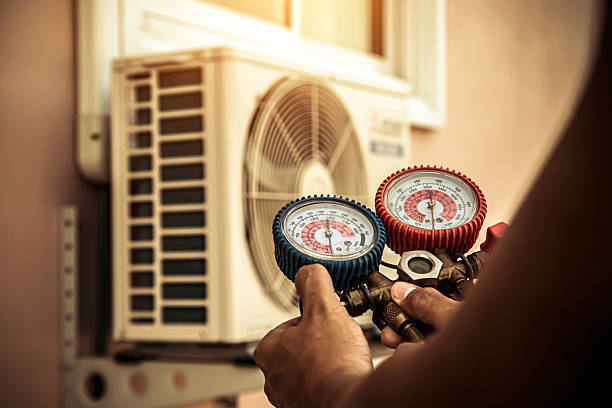 Professional Ac Installation technician working in Grand Mound, IA